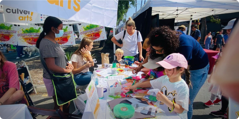 Gathering of people at Culver Arts booth