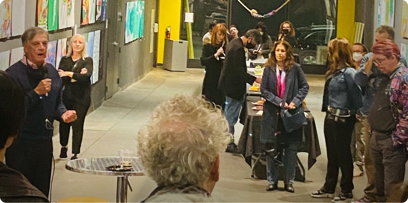 Jim Clarke speaking at an art gallery